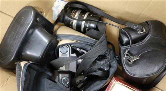 Two Practica cameras, Pentax camera, two 135mm lenses and a case